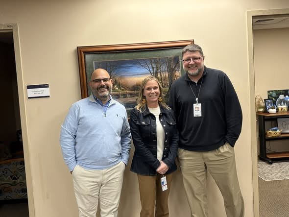 Our team with the hospital's in a hallway at Washington County Hospital and Clinics