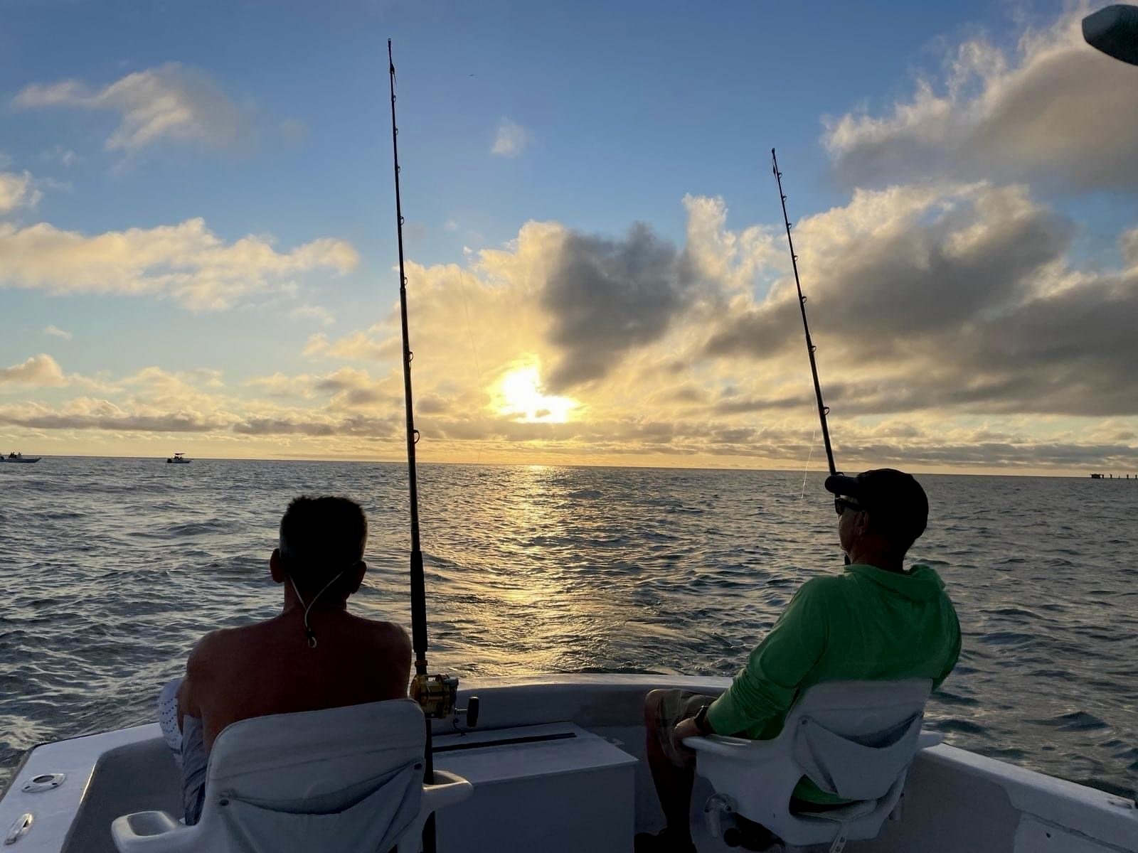 Two rods in the water at sunset off Boca Grande