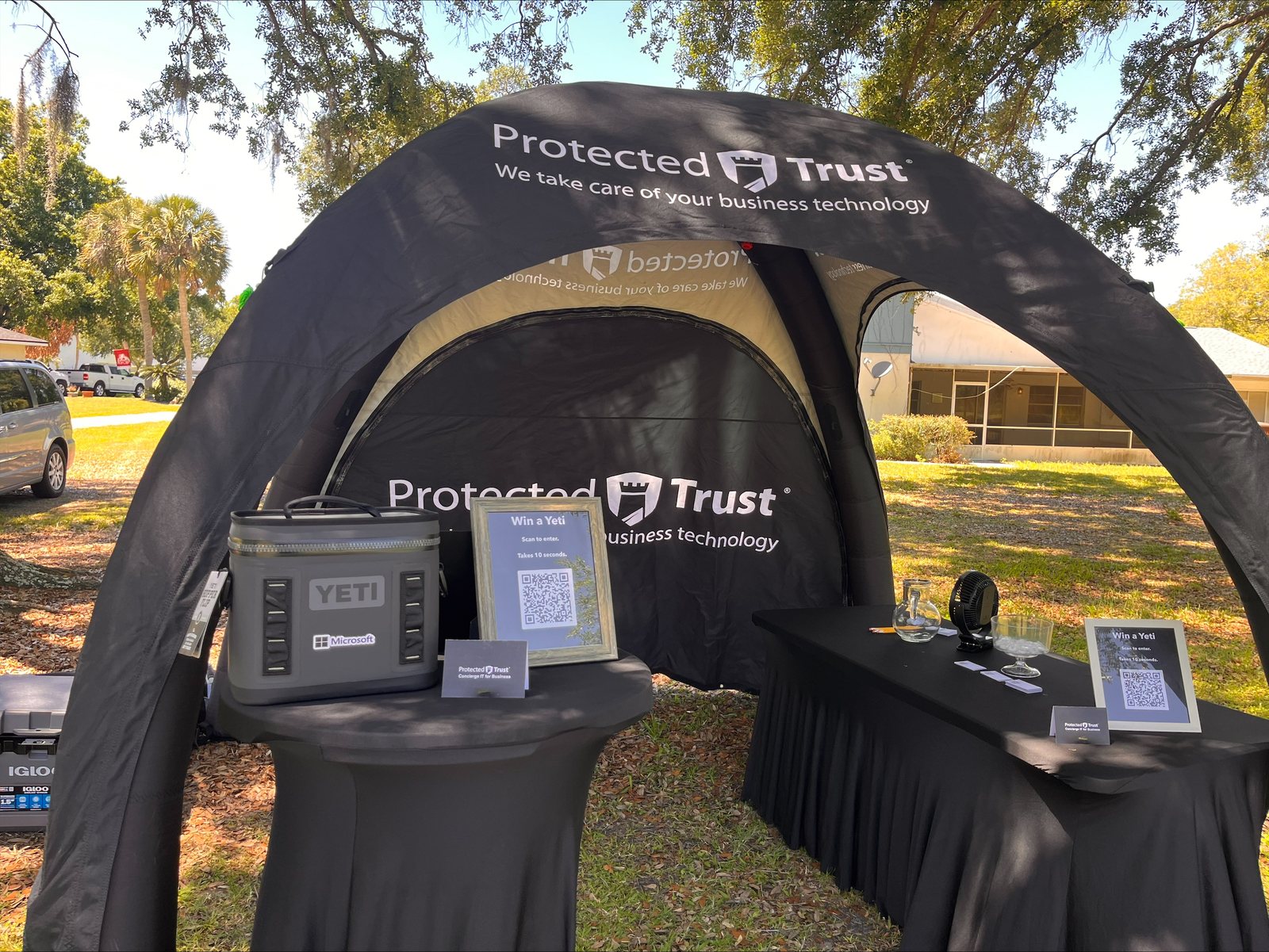 The Protected Trust tent on the course, with the Yeti cooler on the table