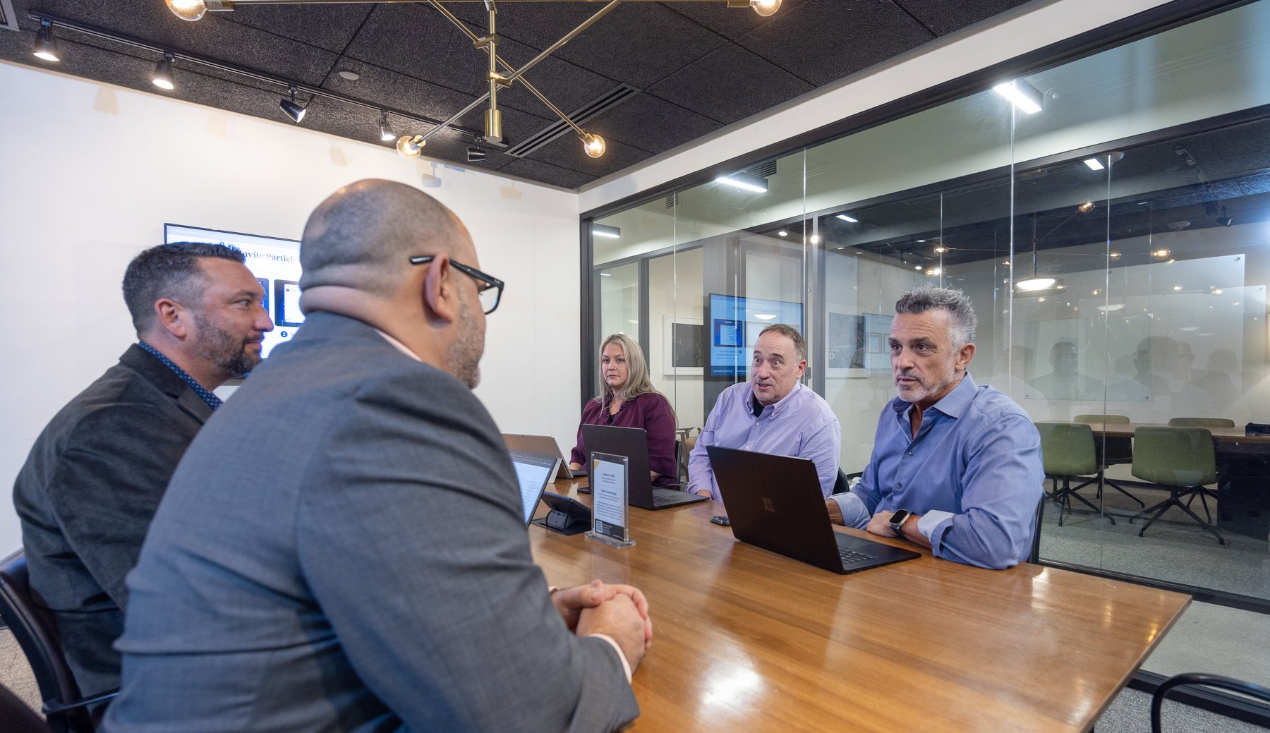 A meeting in the Orlando conference room